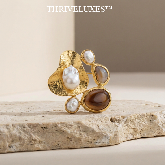 THE LITTORAL BLOOM BROOCH  "Nature does not seek perfection; it seeks character. A wearable fragment of the shoreline, forged in gold and salt."